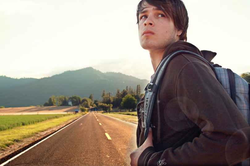 man in the middle of the road