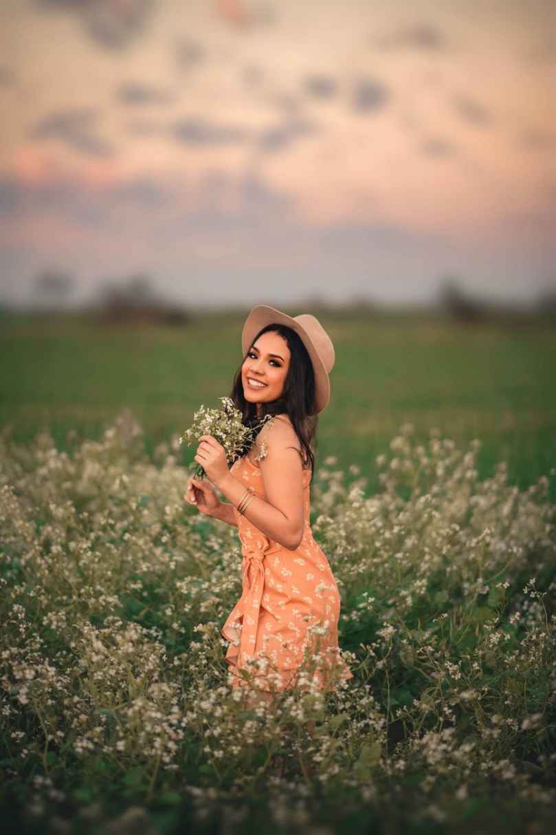 woman holding flowers